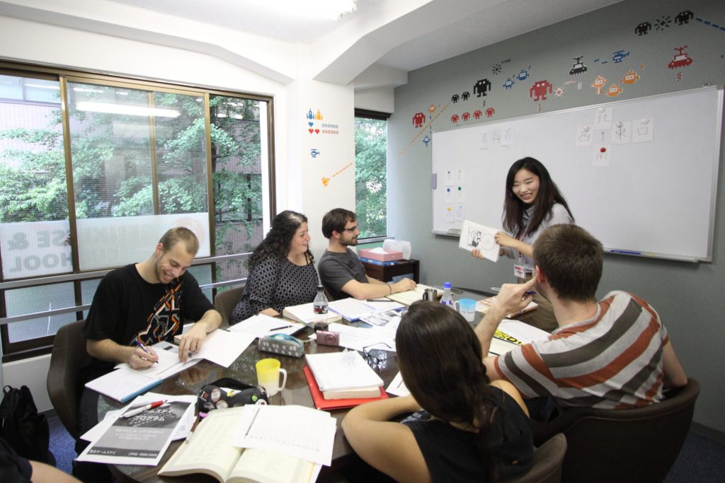 Foreign students taking a small-group Chinese-learning class in China